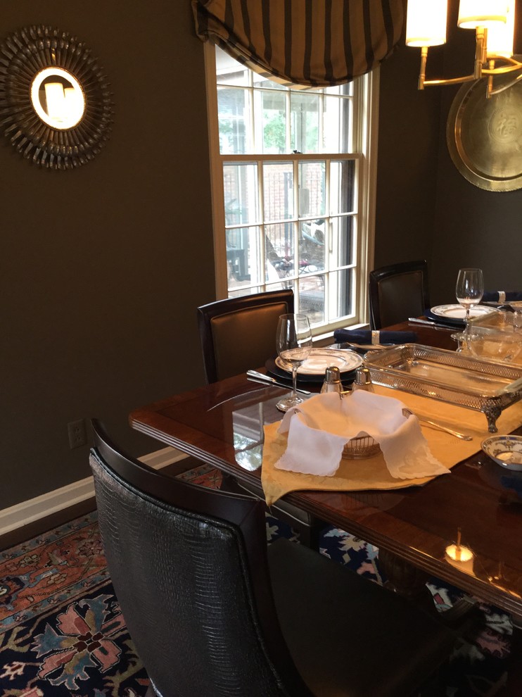 Medium sized traditional dining room in Indianapolis with grey walls and dark hardwood flooring.