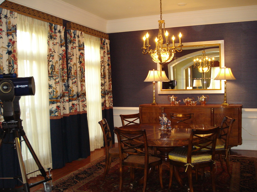 Design ideas for a large classic enclosed dining room in Baltimore with blue walls and medium hardwood flooring.