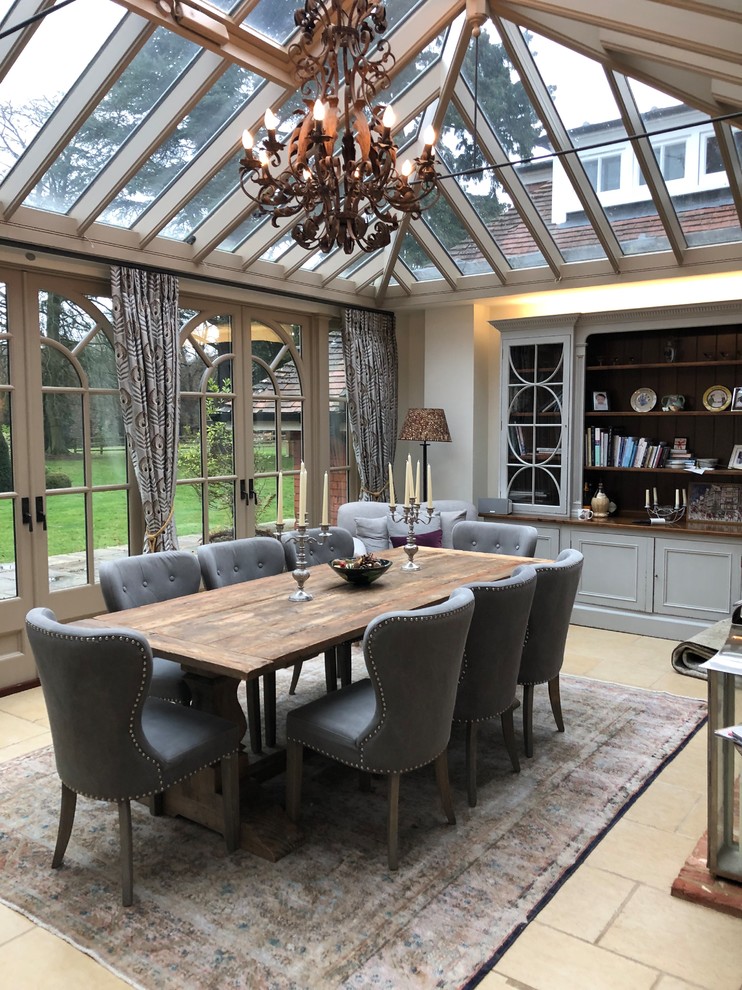 Design ideas for a classic enclosed dining room in Oxfordshire with feature lighting.