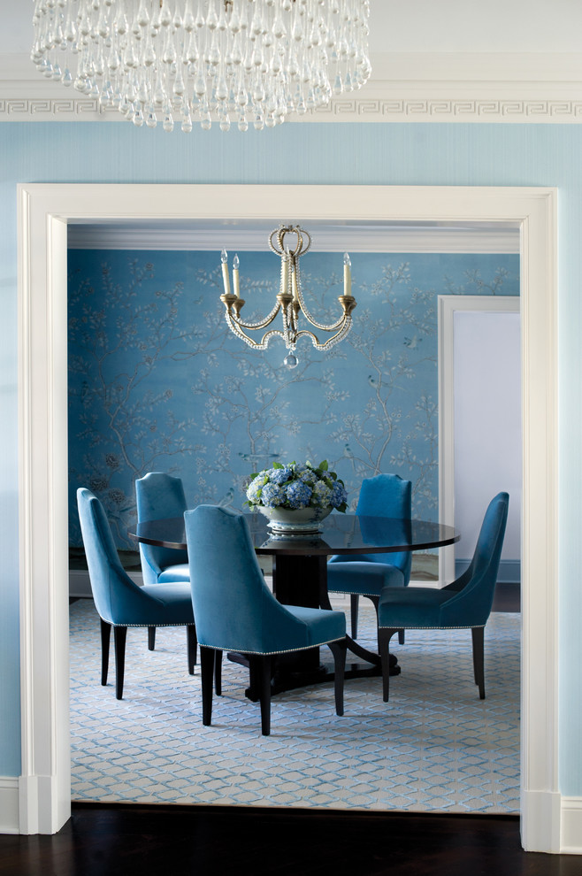 Photo of a classic dining room in New York with blue walls.