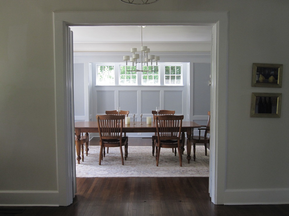 Dining room with painted wood paneling Traditional Dining Room