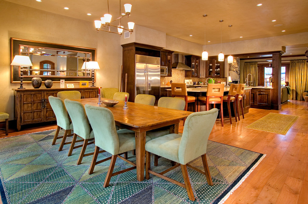 Example of a trendy dining room design in Denver