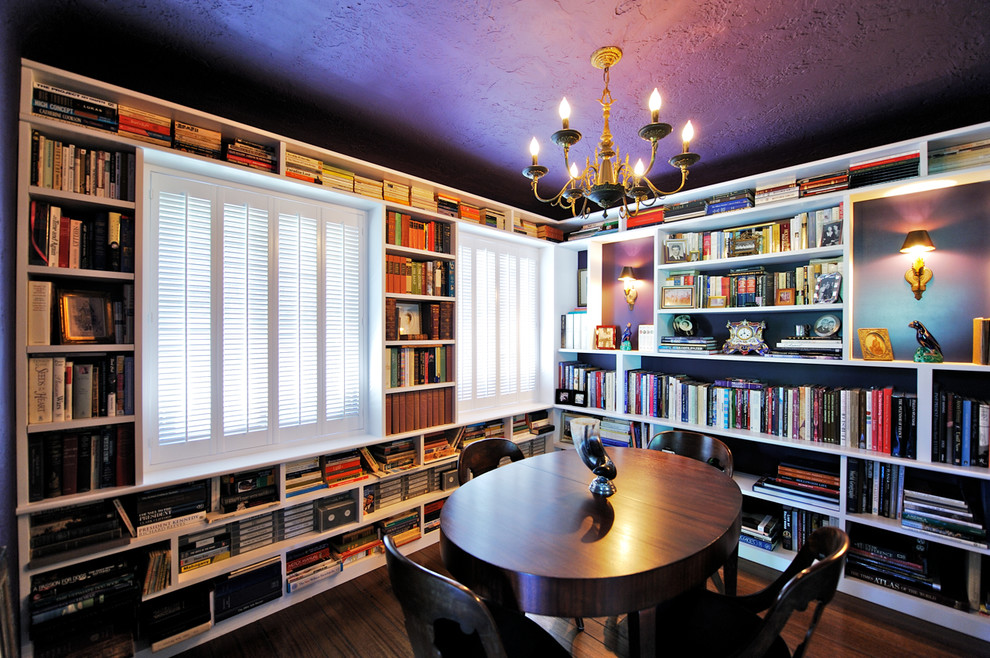 Enclosed dining room - small transitional dark wood floor enclosed dining room idea in Los Angeles with purple walls