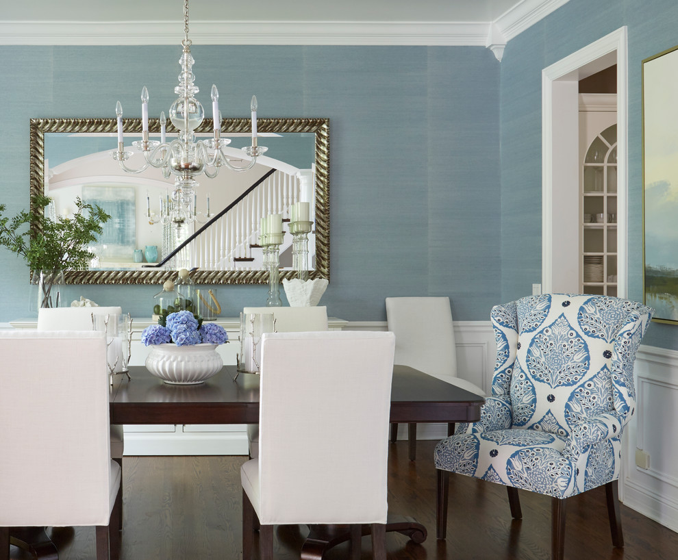 Inspiration for a dark wood floor and brown floor dining room remodel in Chicago with blue walls