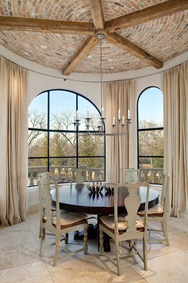 Inspiration for a timeless dining room remodel in Dallas with white walls