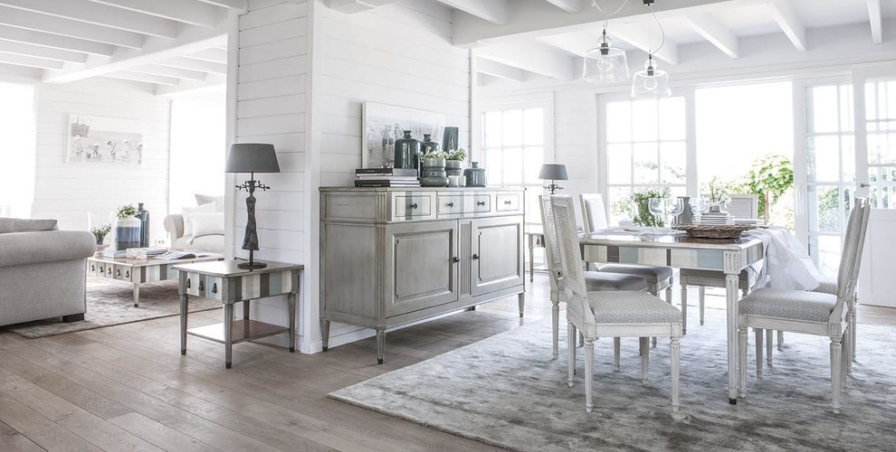 Mid-sized danish light wood floor and beige floor kitchen/dining room combo photo in Kansas City with white walls and no fireplace