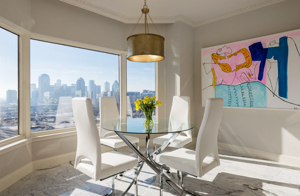 Photo of a contemporary dining room in Dallas with grey walls and grey floors.