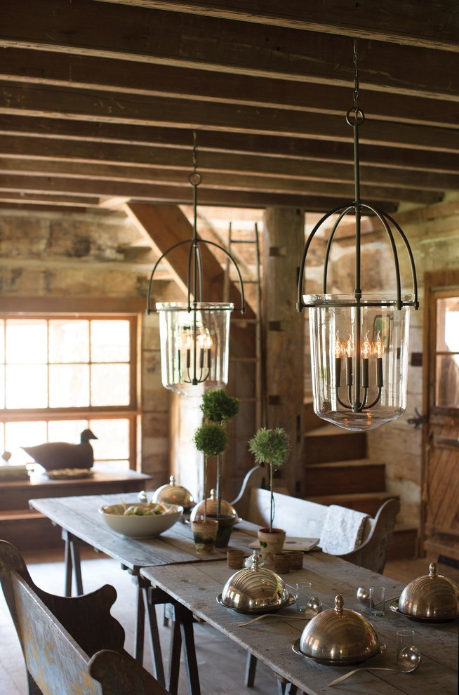 Mid-sized farmhouse medium tone wood floor and brown floor great room photo in Cleveland with beige walls and no fireplace