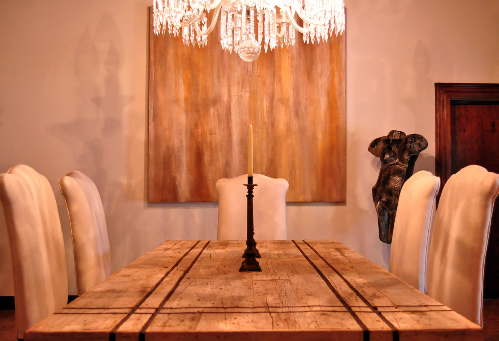 Photo of a small rustic open plan dining room in Austin with beige walls.