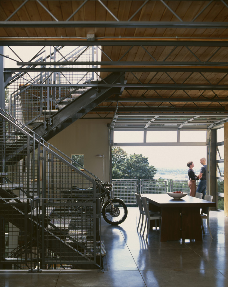 Inspiration for an industrial dining room remodel in Seattle