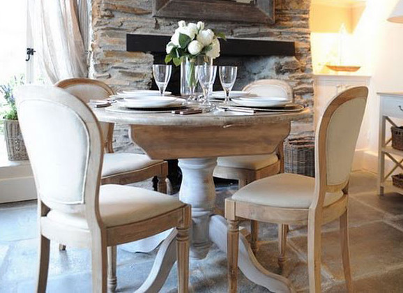 Beach style dining room in Wiltshire.