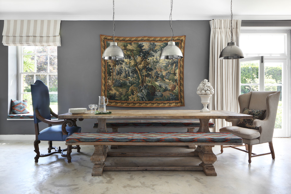 Dining room - french country dining room idea in Dorset with gray walls