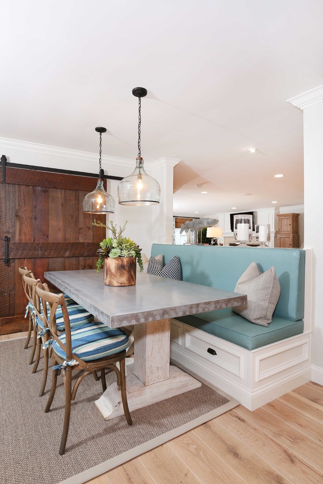 Kitchen/dining room combo - eclectic light wood floor kitchen/dining room combo idea in Orange County