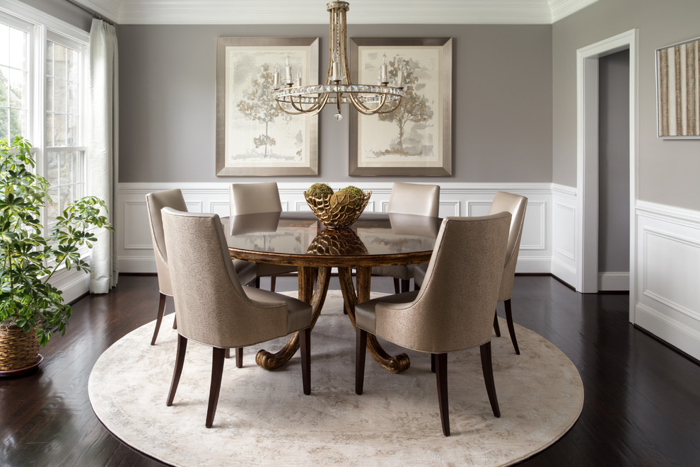 Example of a mid-sized transitional dark wood floor and brown floor enclosed dining room design in DC Metro with gray walls