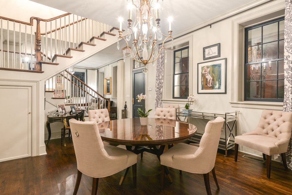 Example of a classic dark wood floor dining room design in Charleston with white walls and no fireplace
