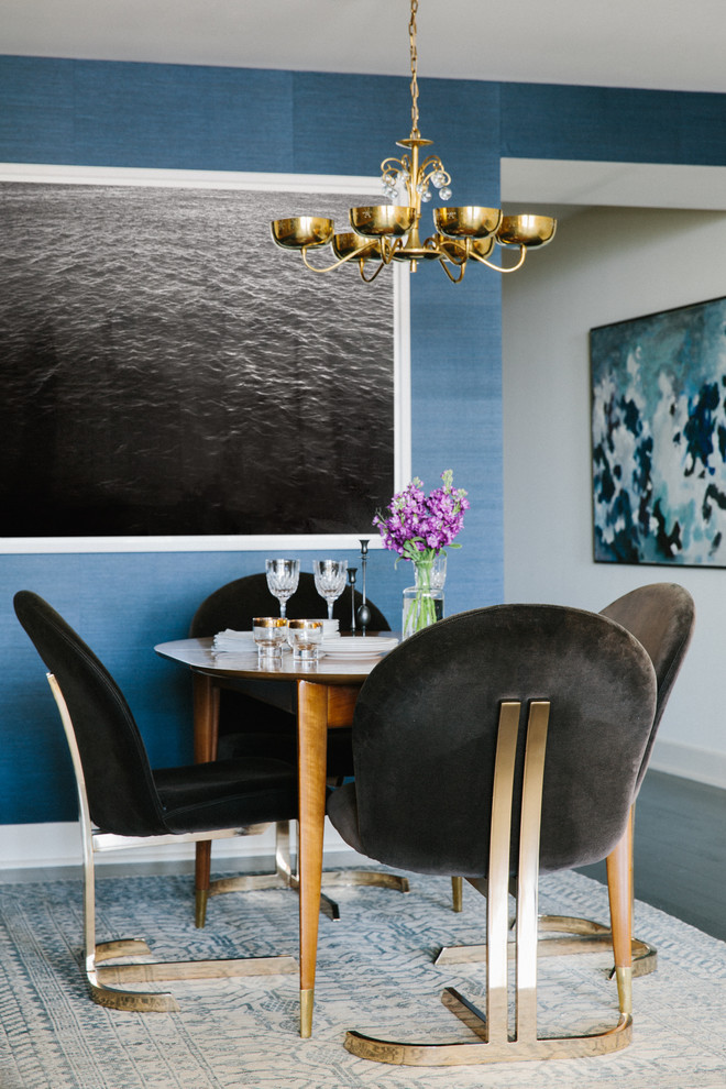 This is an example of a small contemporary dining room in San Francisco with blue walls.
