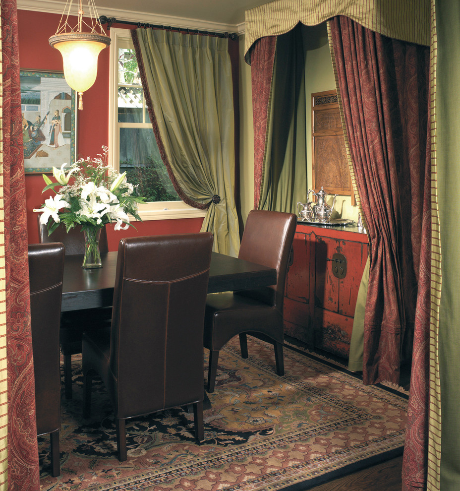Example of a mid-sized classic dark wood floor enclosed dining room design in Portland with green walls and no fireplace