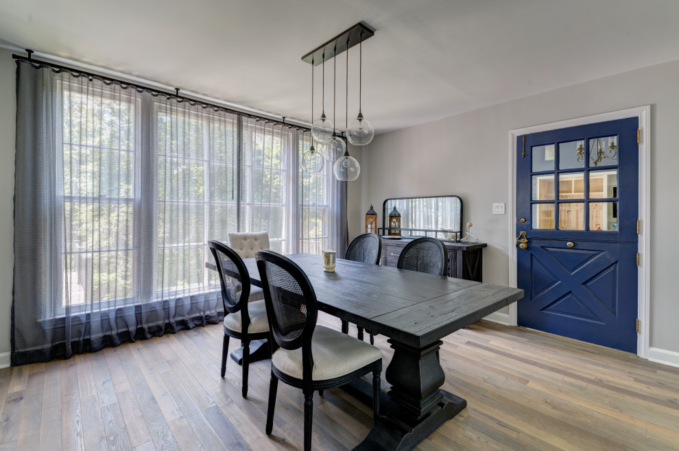 Medium sized traditional dining room in Philadelphia with grey walls, light hardwood flooring and beige floors.