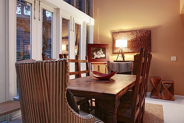 Example of an eclectic dining room design in Seattle