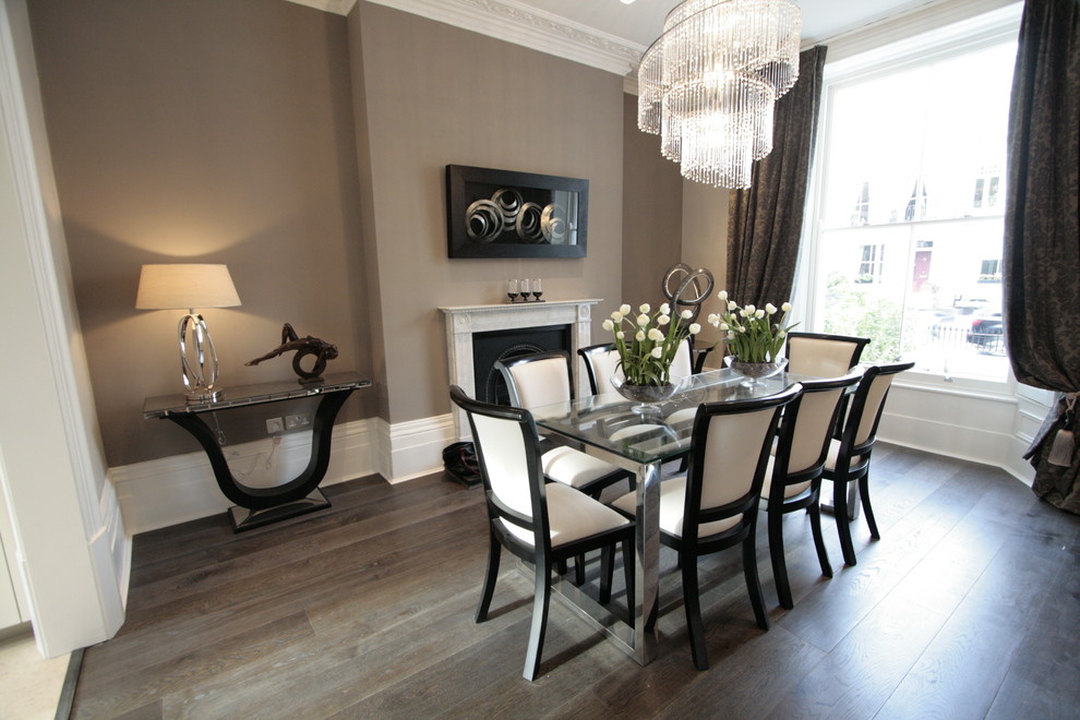 Design ideas for a contemporary dining room in Surrey.