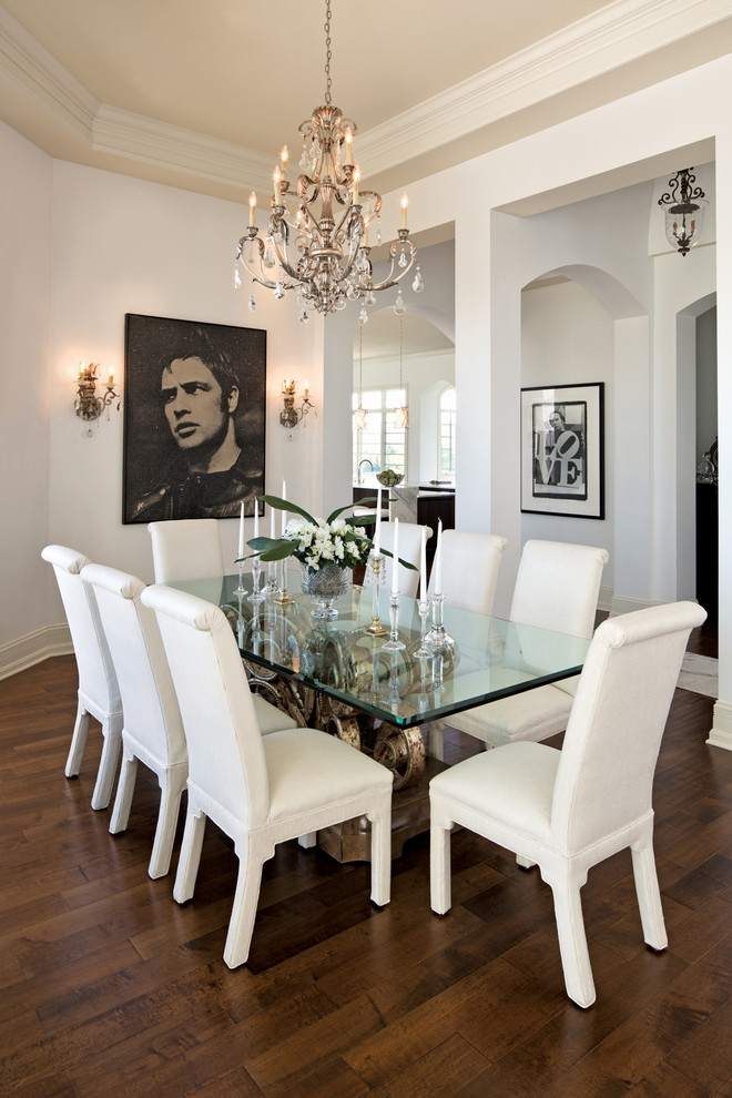 Photo of a contemporary dining room in Indianapolis with white walls and dark hardwood flooring.