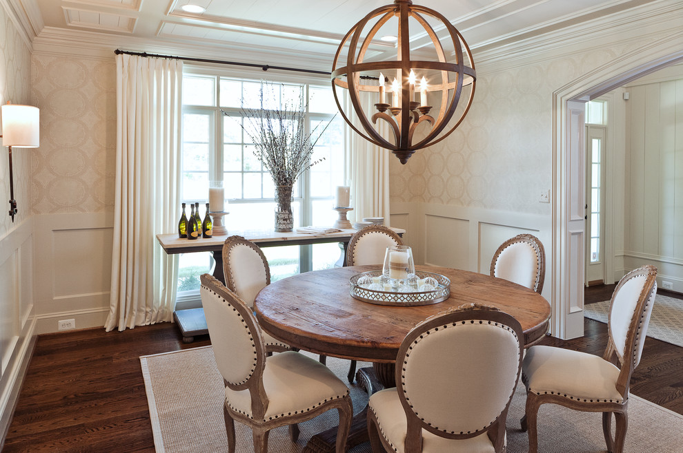 Inspiration for a transitional dark wood floor and brown floor enclosed dining room remodel in DC Metro with beige walls