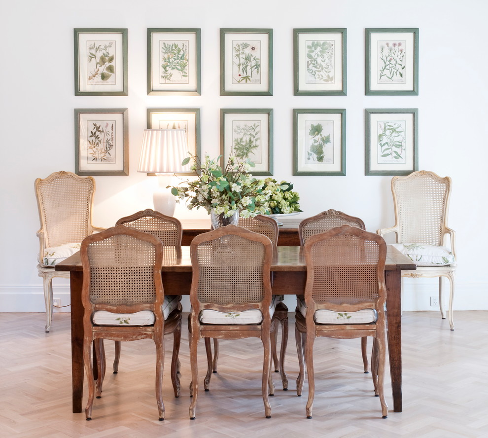 Photo of a contemporary dining room in Melbourne with white walls.