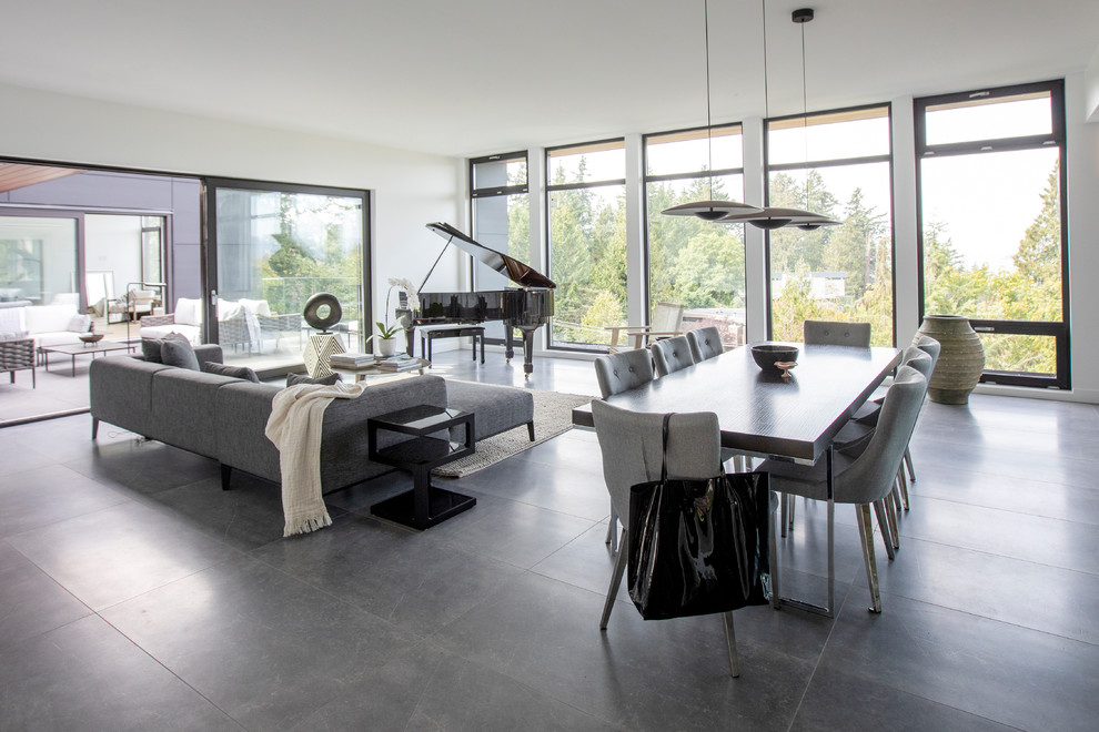 Medium sized contemporary open plan dining room in Vancouver with white walls, ceramic flooring, no fireplace and grey floors.