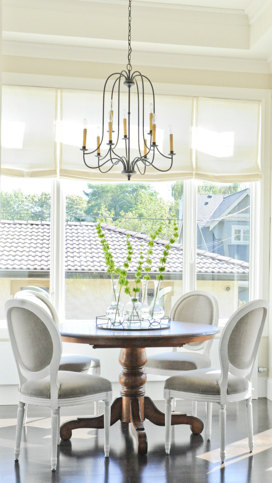Elegant dining room photo in Vancouver with beige walls