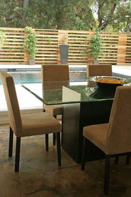 Design ideas for a small contemporary open plan dining room in Los Angeles with no fireplace.