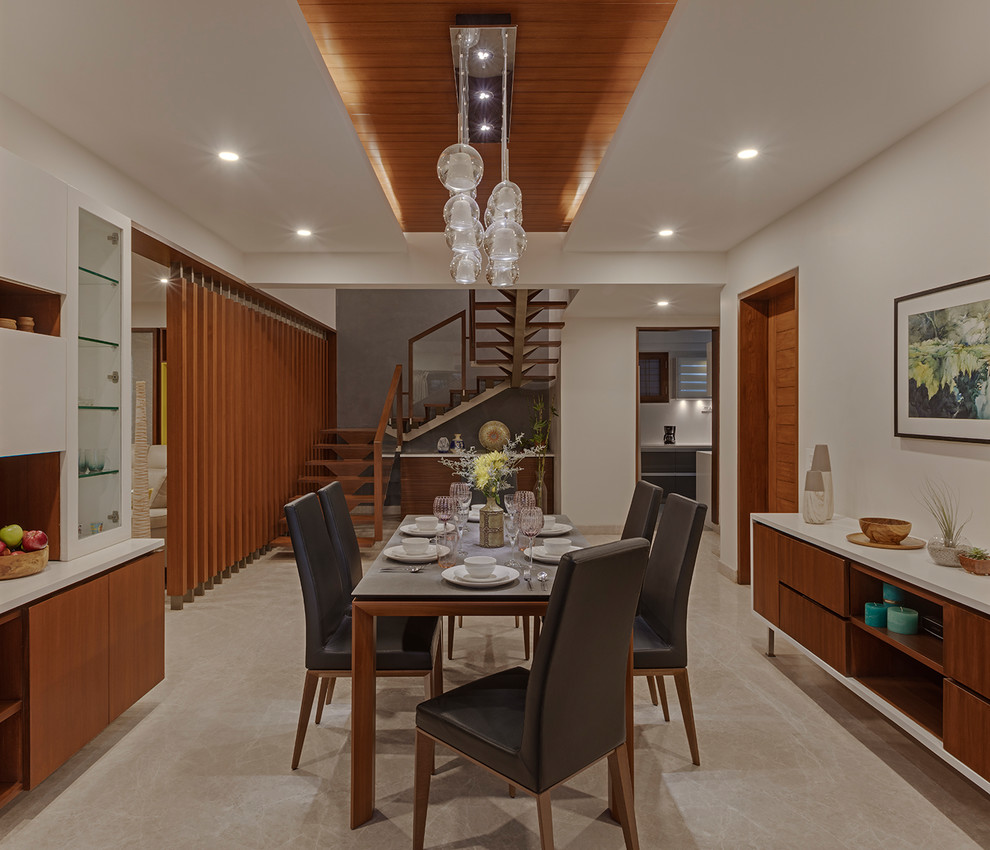 Example of a trendy dining room design in Bengaluru