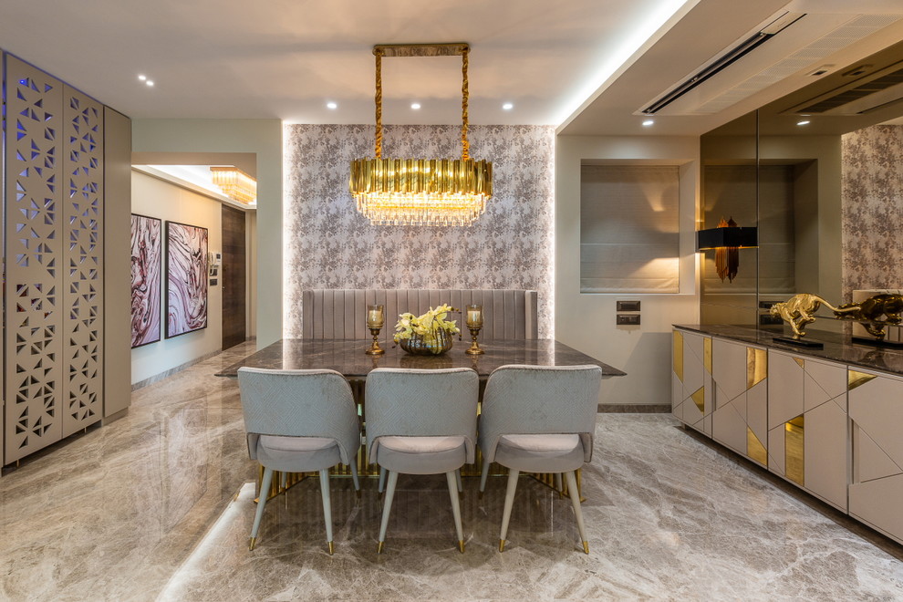 Example of a mid-sized trendy marble floor and beige floor dining room design in Mumbai with beige walls