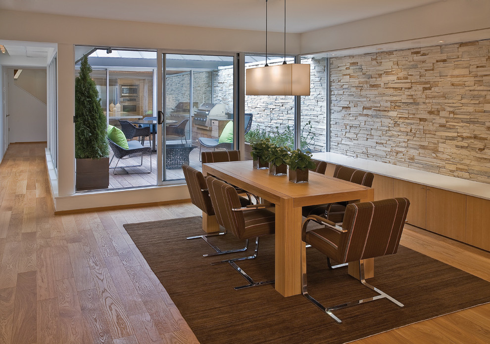 Example of a mid-sized kitchen/dining room combo design in Toronto with beige walls