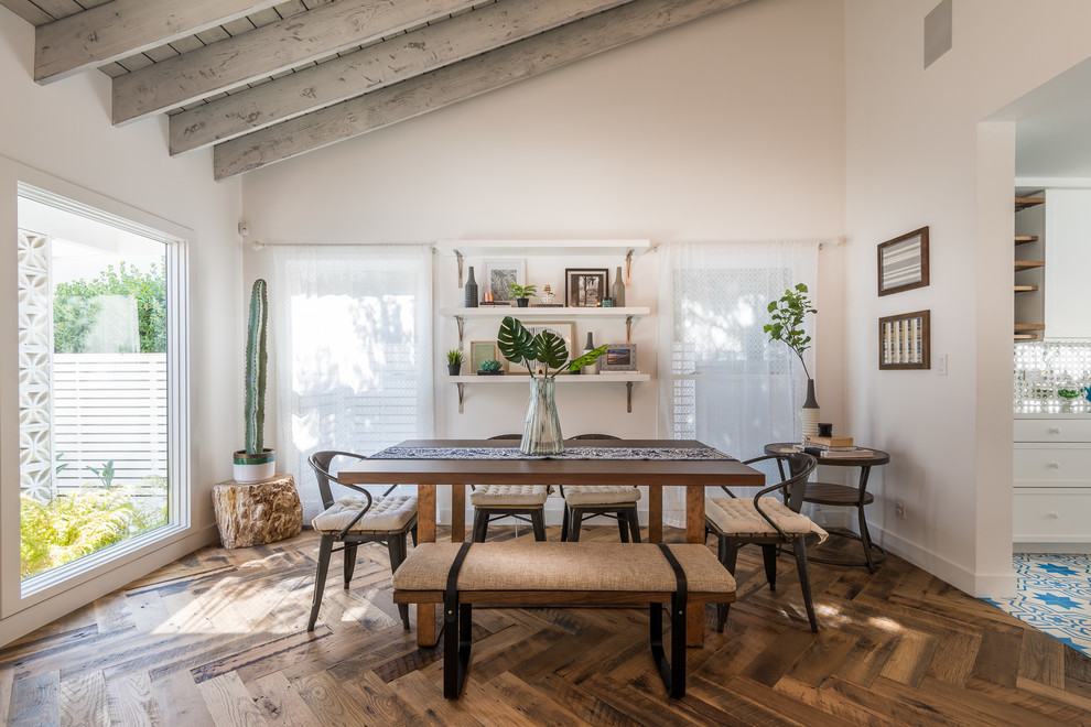 Medium sized midcentury dining room in Los Angeles with dark hardwood flooring, brown floors, beige walls and no fireplace.