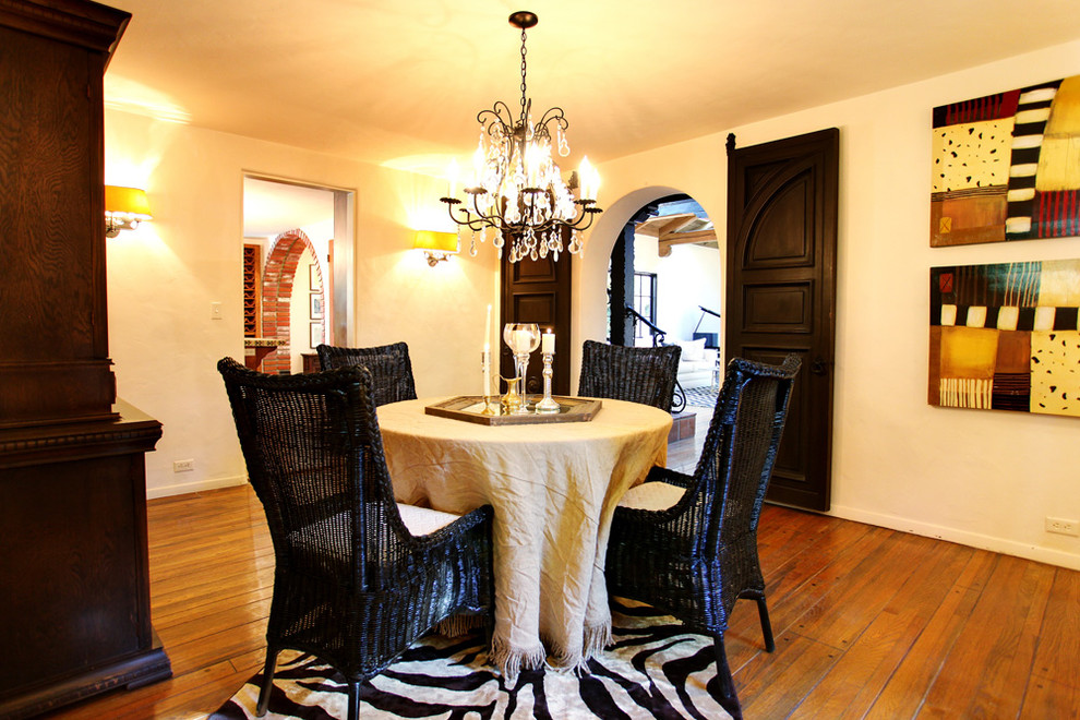 This is an example of a mediterranean dining room in Other.