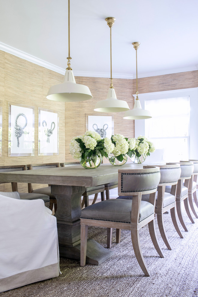 Inspiration for a large transitional enclosed dining room remodel in New York with beige walls