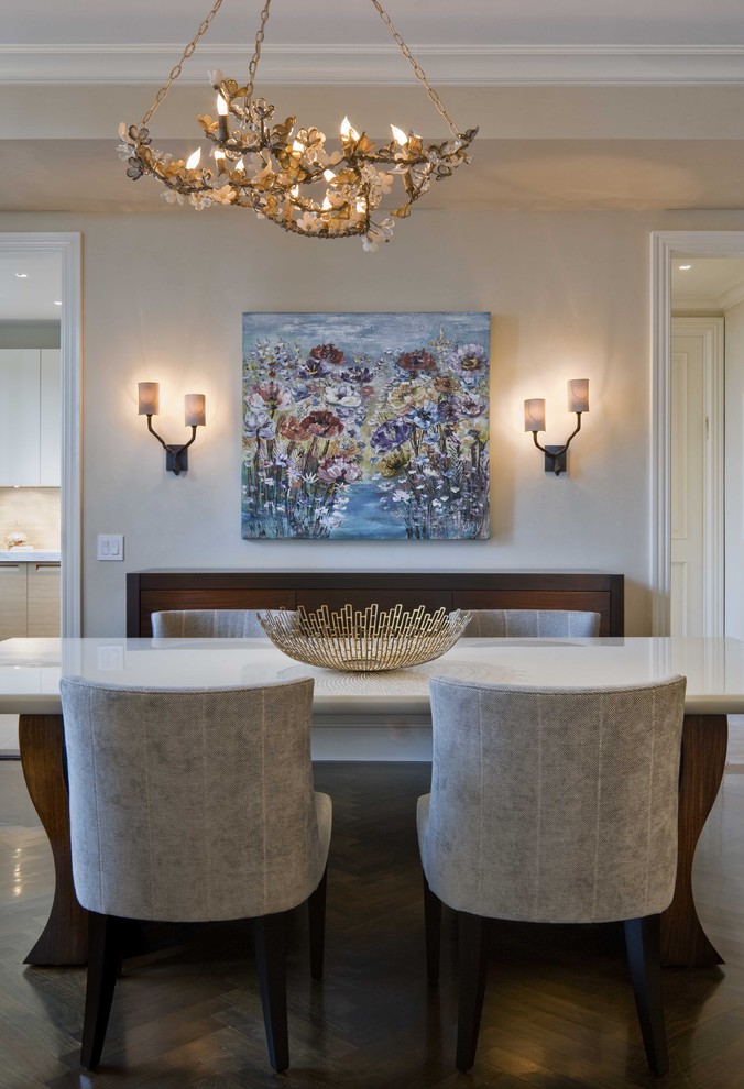 Contemporary dining room in New York with beige walls and dark hardwood flooring.
