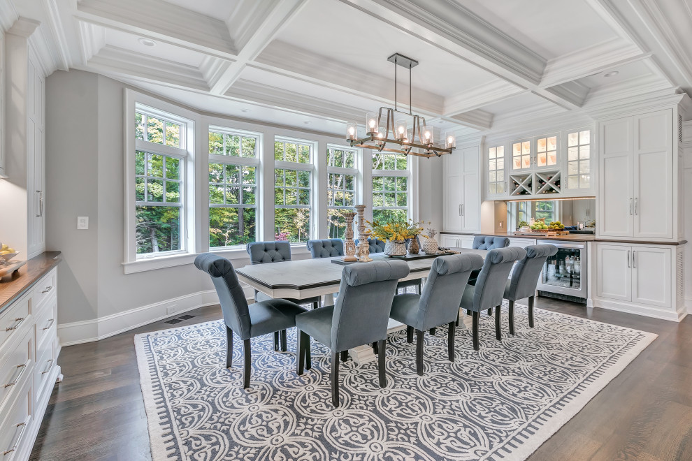 Inspiration for a large transitional dark wood floor and brown floor kitchen/dining room combo remodel in New York with beige walls and no fireplace