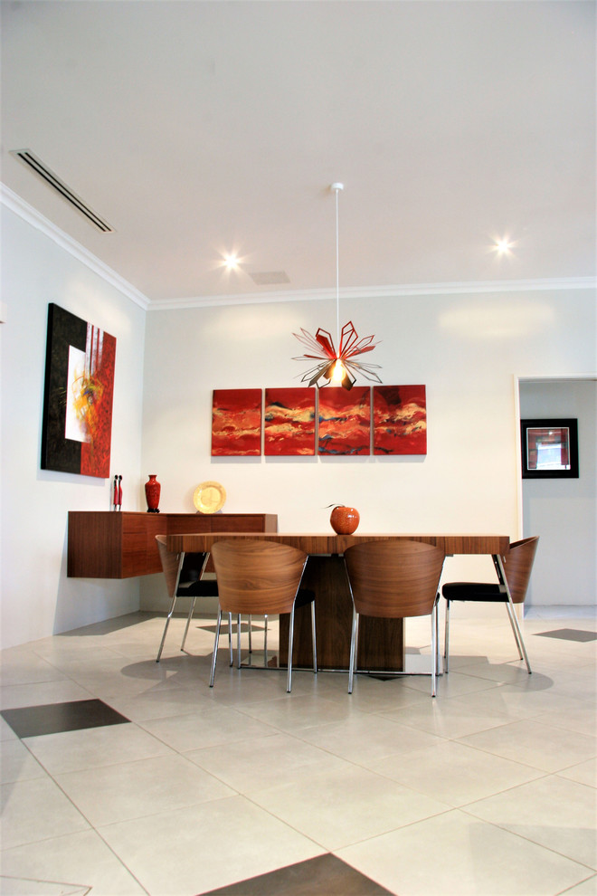 Photo of a medium sized industrial open plan dining room in Perth with white walls, ceramic flooring, a two-sided fireplace, a wooden fireplace surround and white floors.