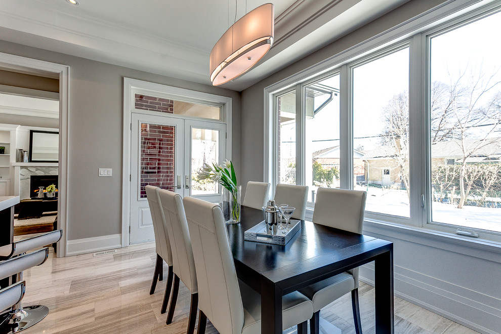 Transitional dining room photo in Toronto