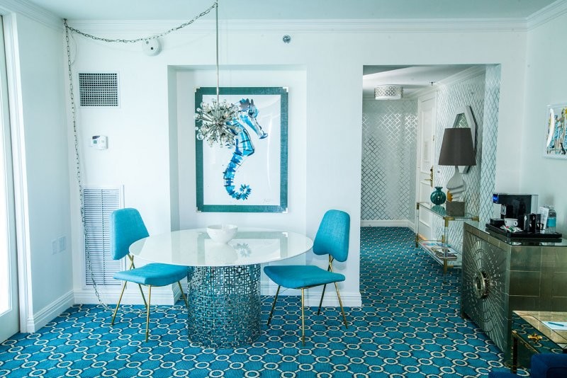 This is an example of a small coastal dining room in Miami.