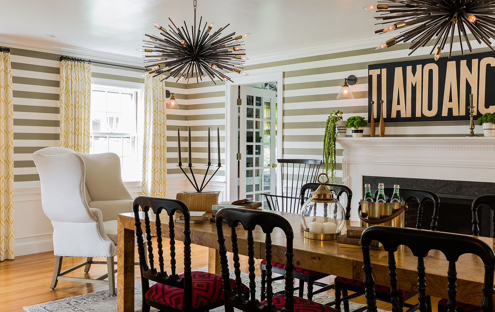 Enclosed dining room - eclectic medium tone wood floor enclosed dining room idea in Boston