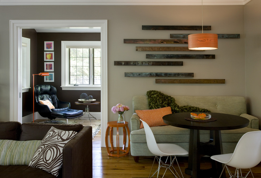 Inspiration for a timeless medium tone wood floor dining room remodel in Boston with beige walls