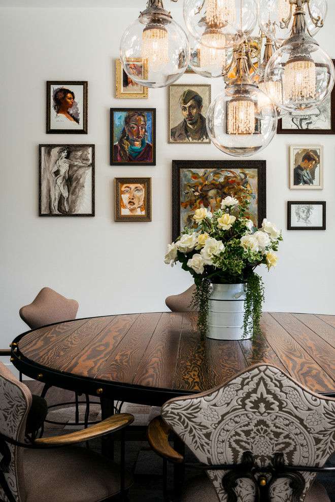 Design ideas for an eclectic dining room in Los Angeles with white walls.