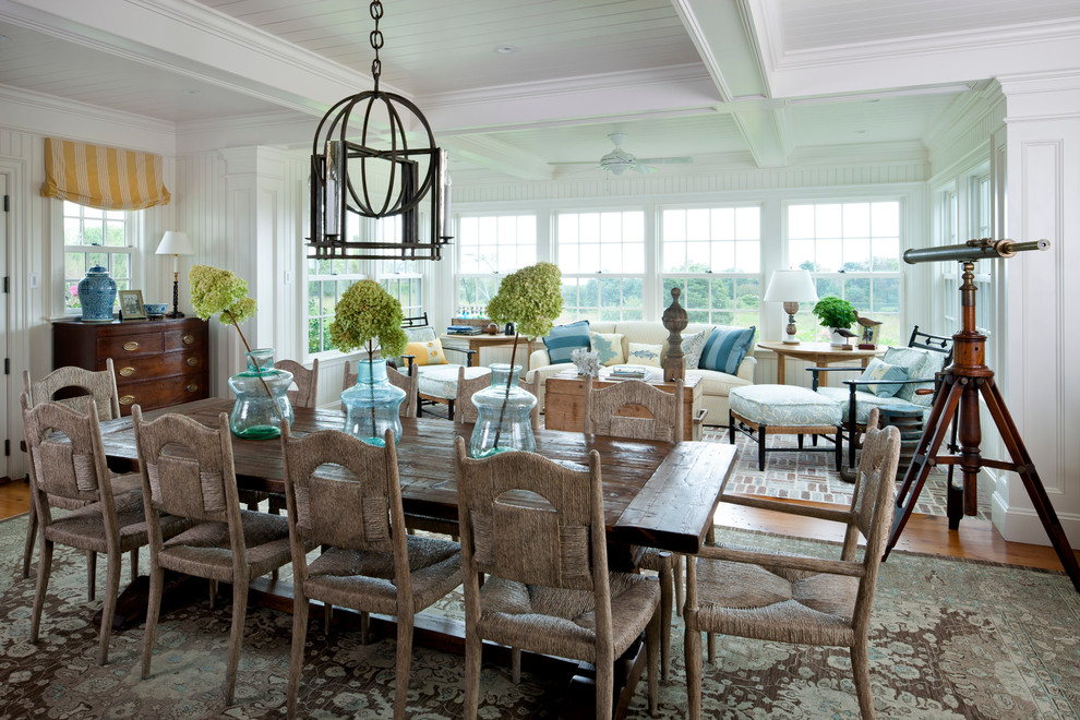 Photo of a beach style dining room in Boston.