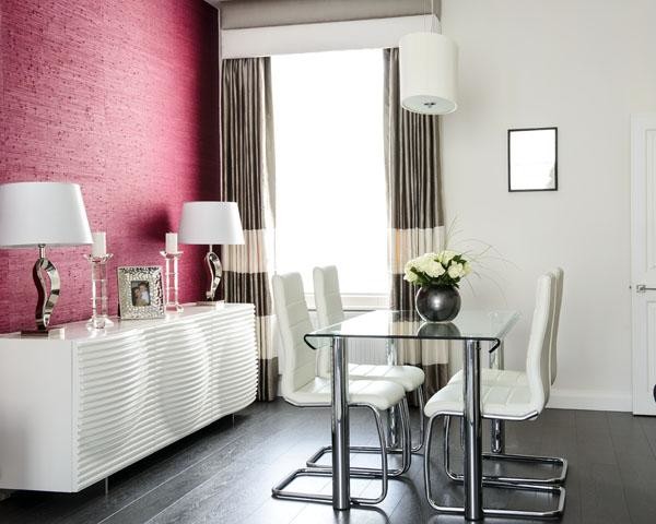 Design ideas for a medium sized contemporary dining room in London with pink walls.