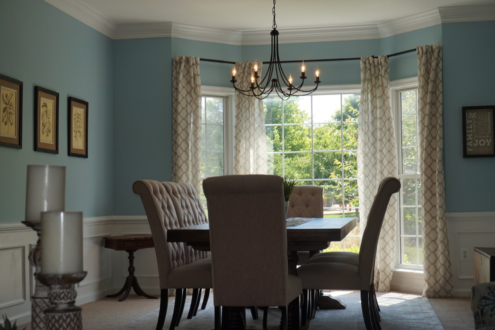 Photo of a medium sized traditional enclosed dining room in Baltimore with blue walls, carpet, no fireplace and beige floors.