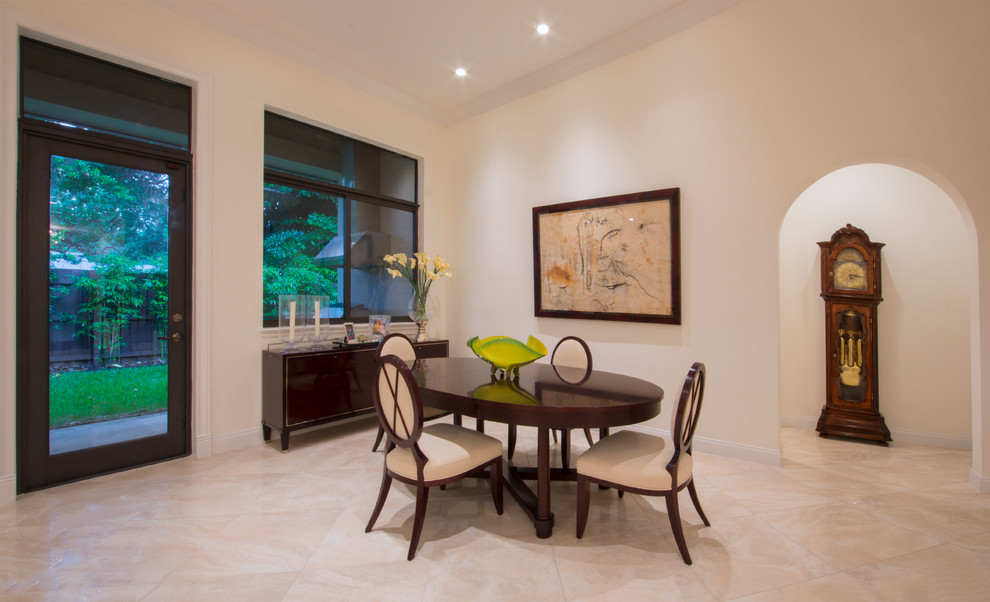 Kitchen/dining room combo - mid-sized marble floor kitchen/dining room combo idea in Miami with beige walls