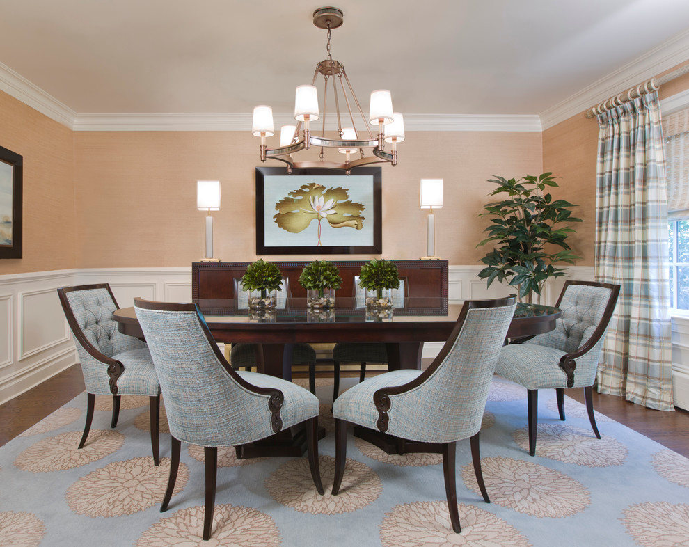 Inspiration for a mid-sized timeless dark wood floor and brown floor enclosed dining room remodel in New York with beige walls and no fireplace