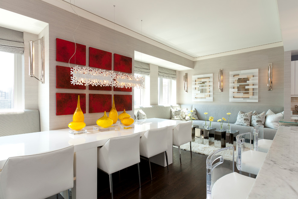 This is an example of a contemporary dining room in Chicago with grey walls.